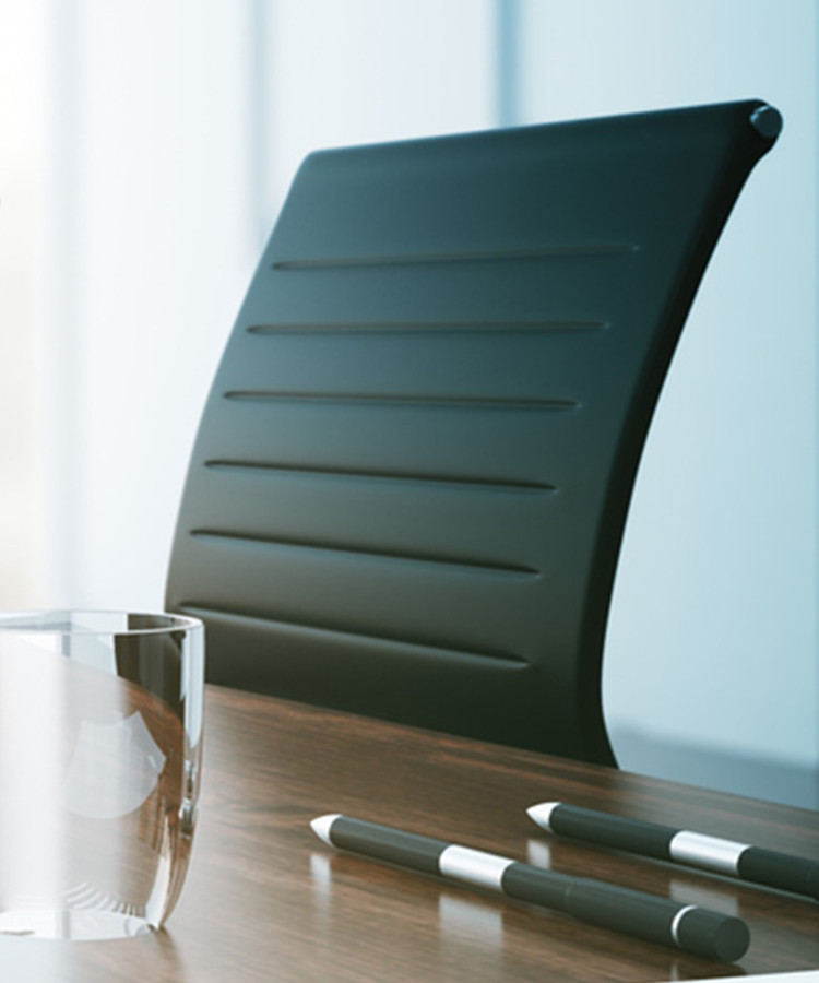 Photo of chair in a meeting room.