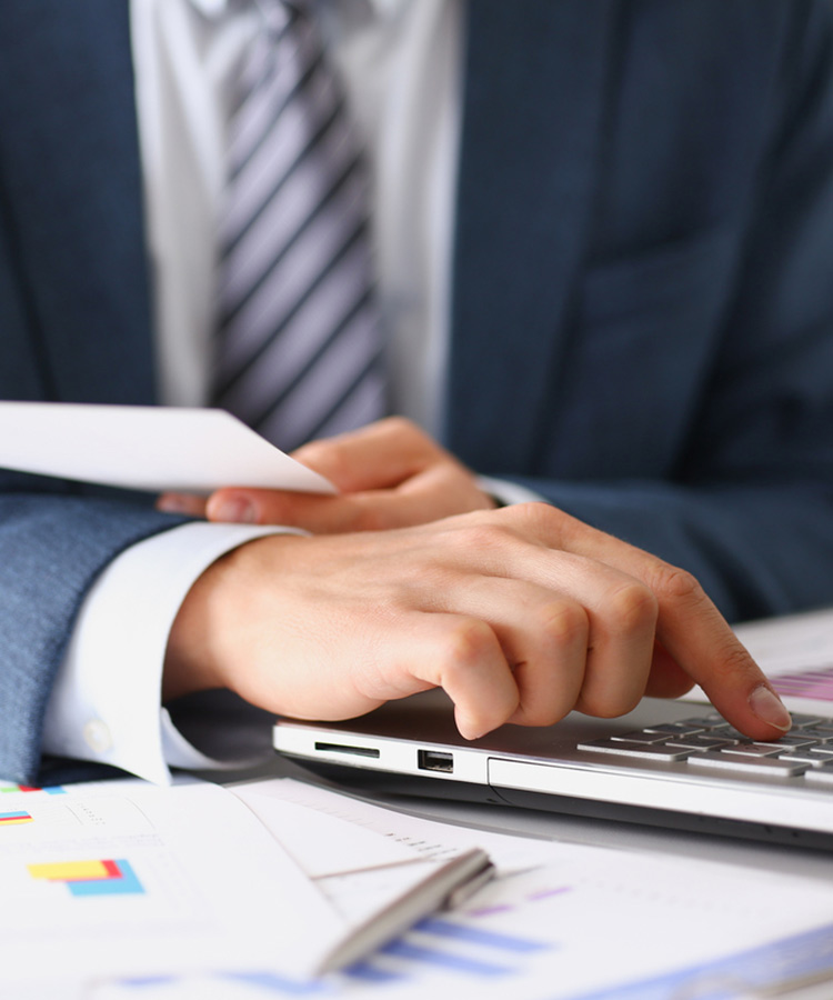 Photo of a person creating dividend payments.